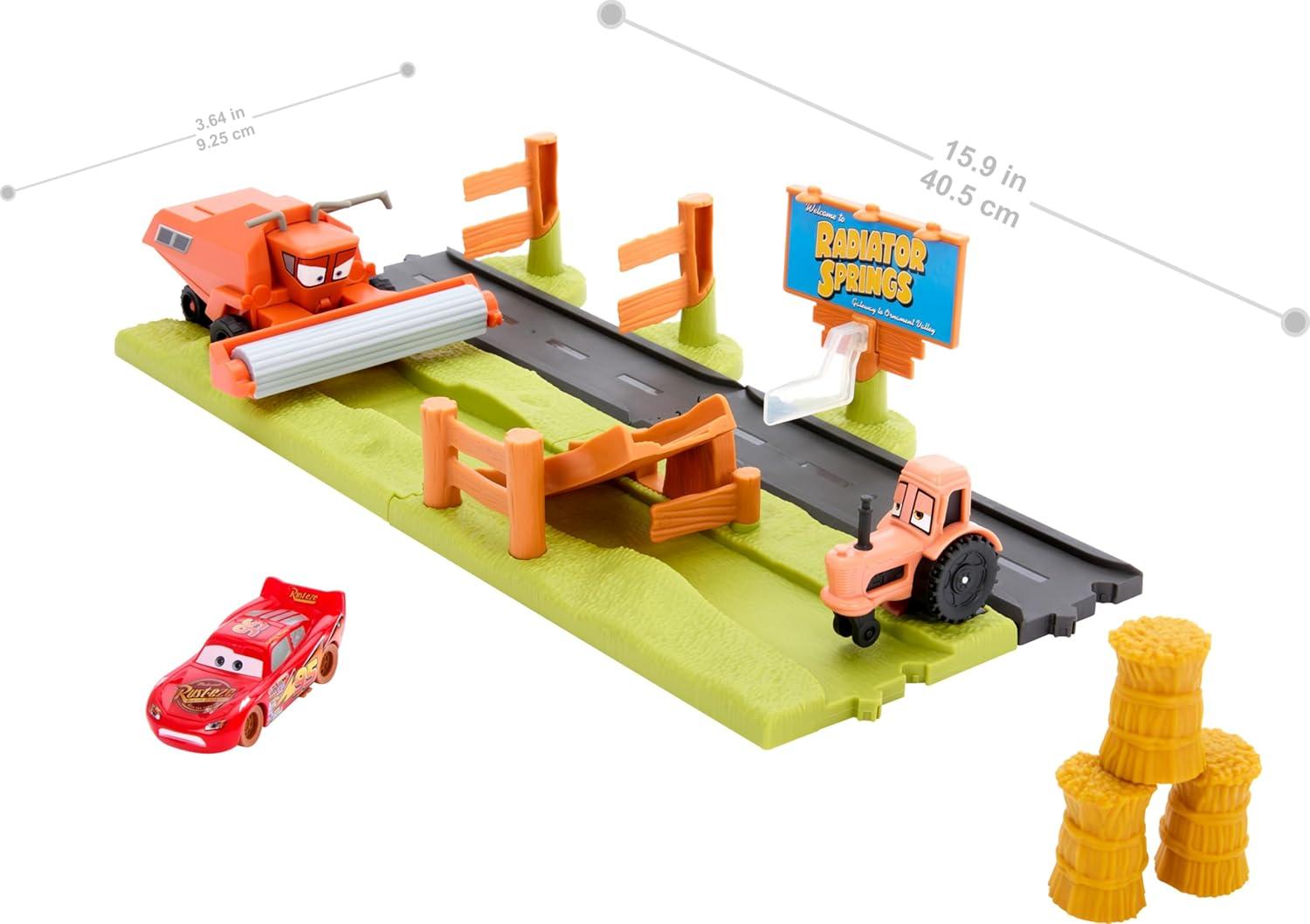 imageMattel Disney and Pixar Cars Playset with 3 Toy Vehicles amp 2 Ways to Play Frank Escape amp Stunt Race Set Includes Lightning McQueen