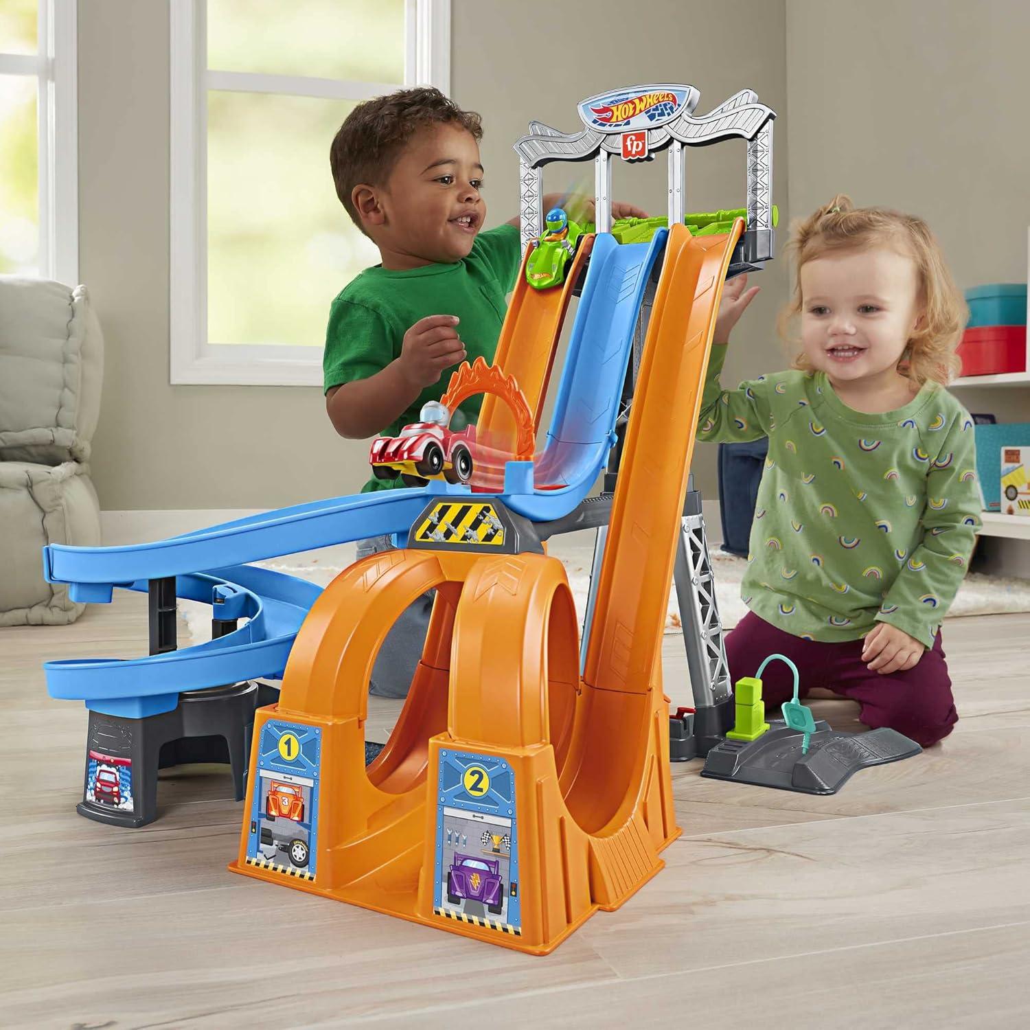 imageFisherPrice Little People Toddler Toy Hot Wheels Racing Loops Tower Race Track with Stunt Ramp amp Sounds for Pretend Play Ages 18 Months Amazon ExclusiveRacing