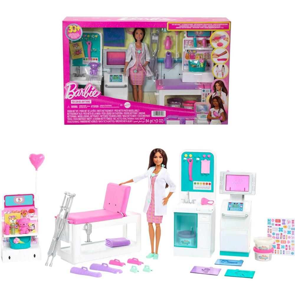 imageBarbie Fast Cast Clinic Playset Brunette Barbie Doctor Doll 30 Play Pieces 4 Play Areas Cast amp Bandage Making Medical amp Xray Stations Exam Table Gift Shop amp More Great Toy for 3 Years amp Up