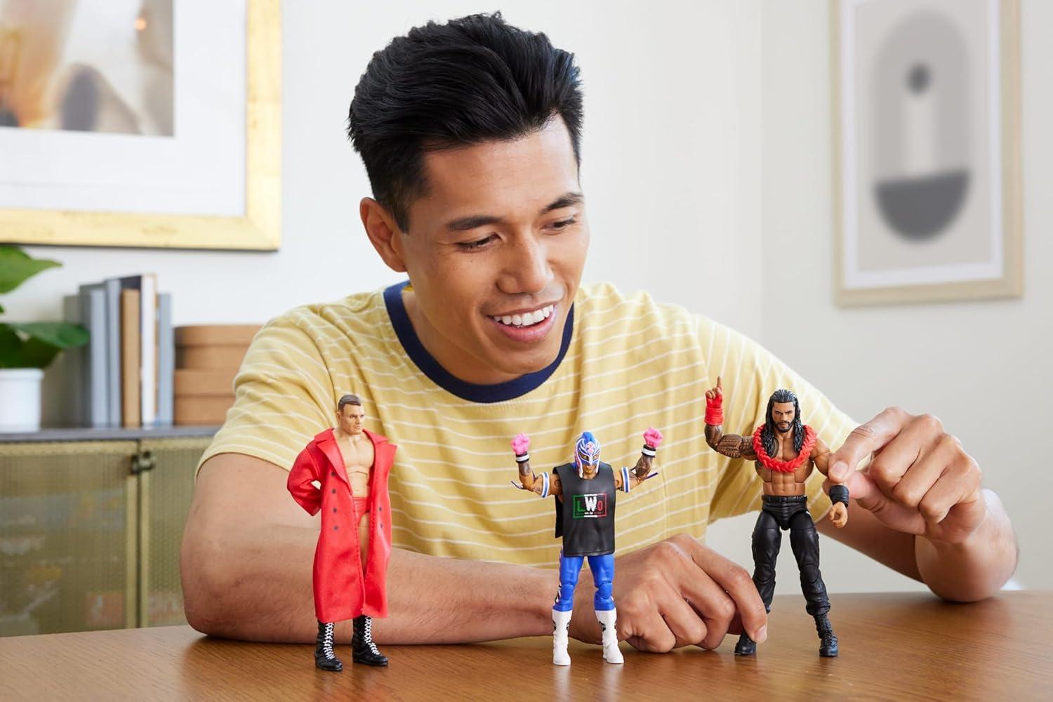 imageMattel WWE Top Picks Elite Action Figure amp Accessories Set Rey Mysterio 6inch Collectible with Swappable Hands Ring Gear amp 25 Articulation PointsRey Mysterio