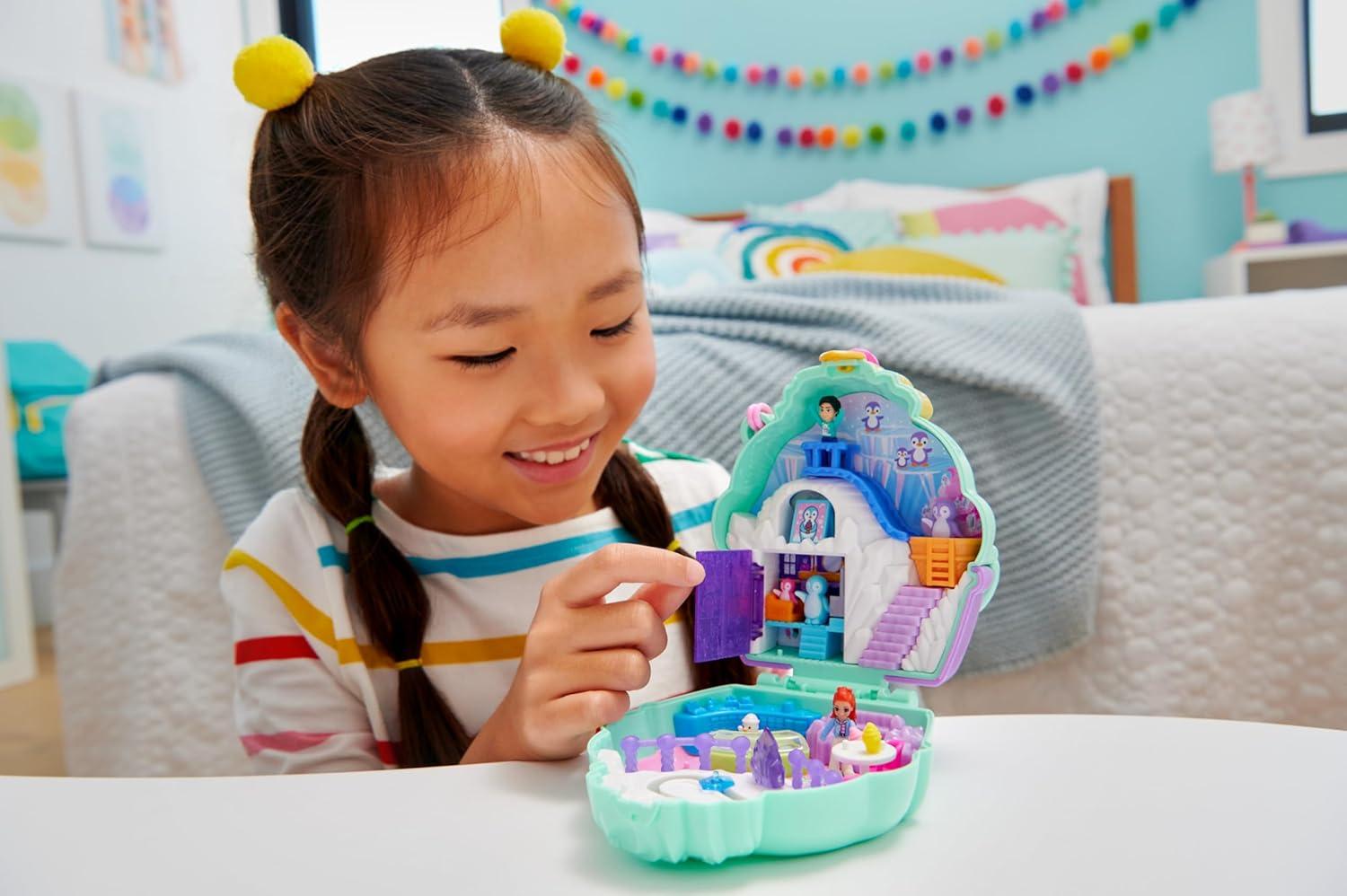 imagePolly Pocket Dolls amp Playset Snow Sweet Penguin Compact with 13 Accessories Travel Toy with Fidget ExteriorPenguin