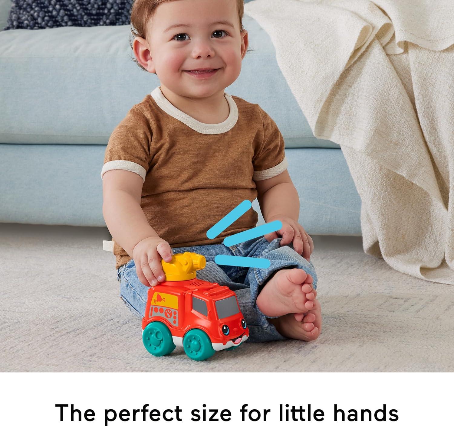 imageFisherPrice Baby Toy Rollin Tractor PushAlong Vehicle with Fine Motor Activities for Infants Ages 6 MonthsFire Truck