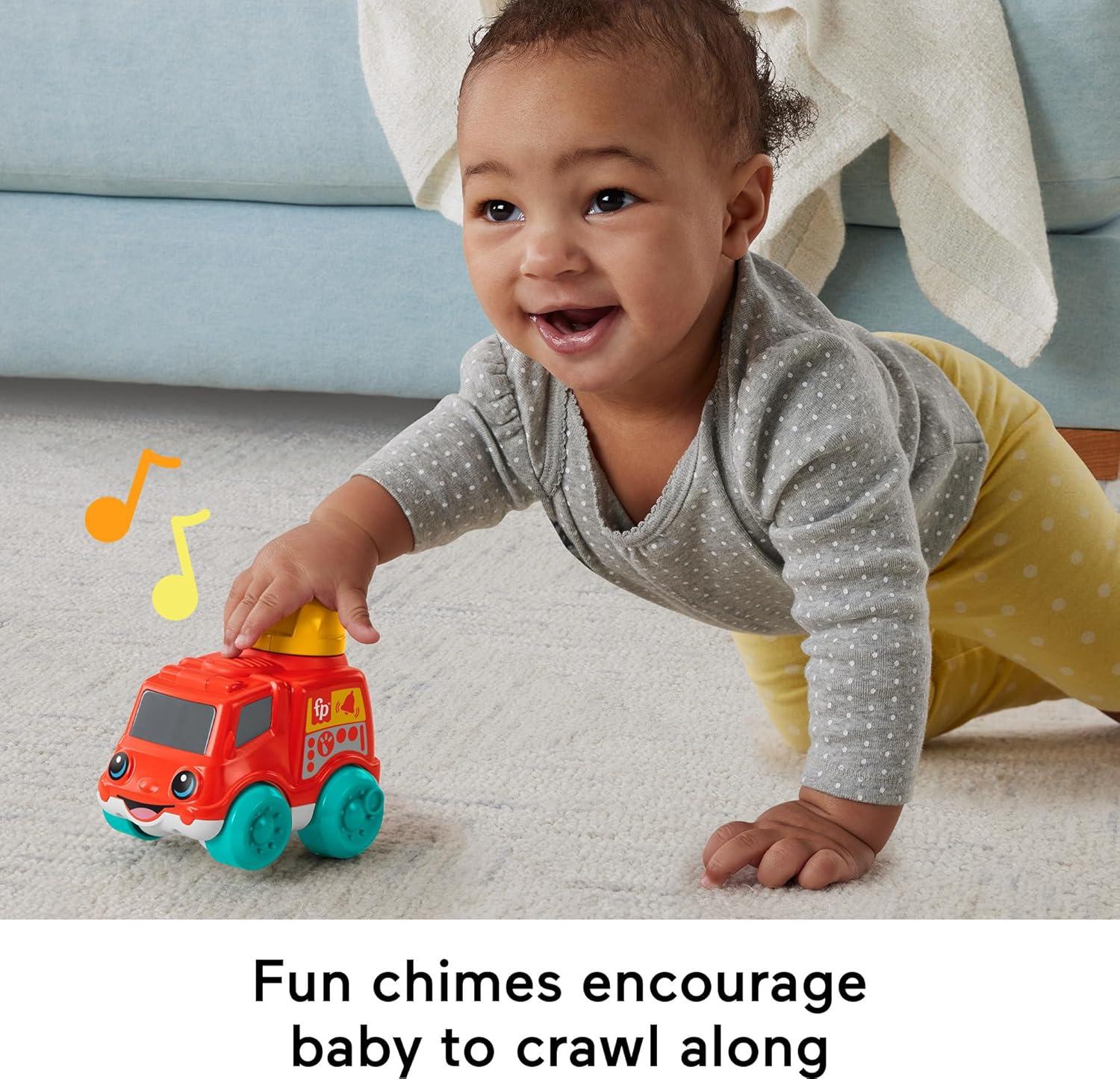 imageFisherPrice Baby Toy Rollin Tractor PushAlong Vehicle with Fine Motor Activities for Infants Ages 6 MonthsFire Truck