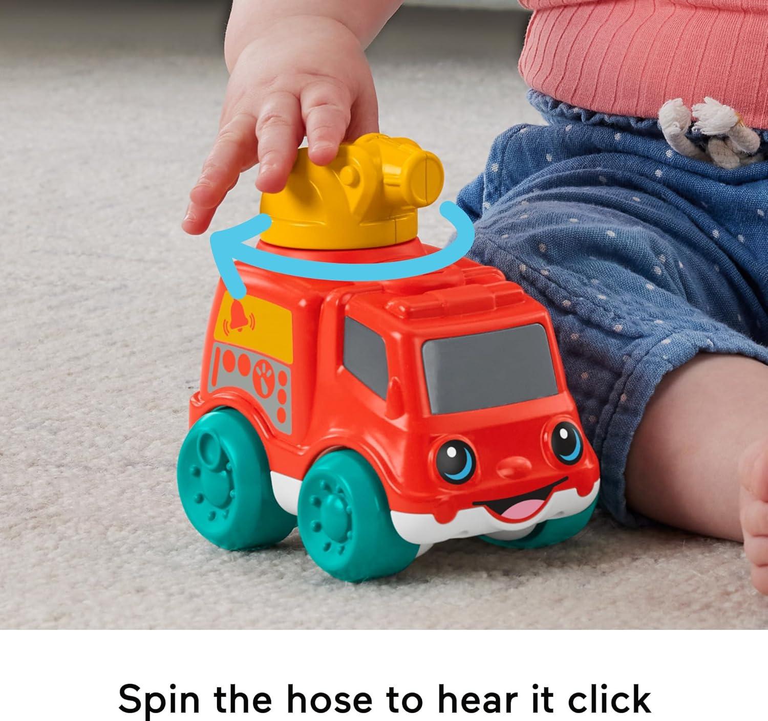imageFisherPrice Baby Toy Rollin Tractor PushAlong Vehicle with Fine Motor Activities for Infants Ages 6 MonthsFire Truck