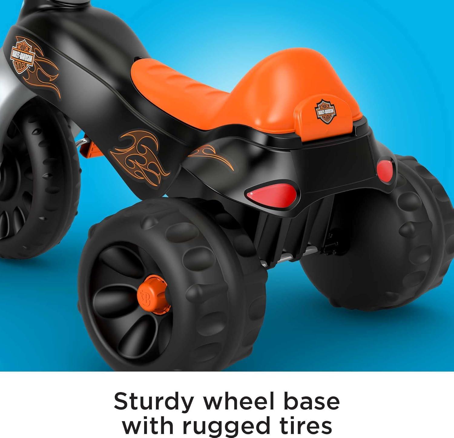imageFisherPrice Toddler Tricycle Hot Wheels Tough Trike Toy Bike with Handlebar Grips amp Storage for Outdoor Play Kids Ages 2 YearsHarley Davidson
