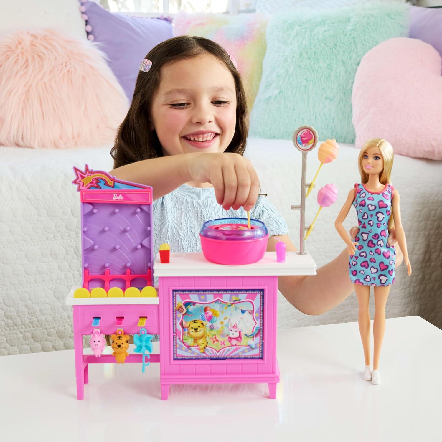imageBarbie Mysteries Beach Detectives Malibu Doll amp Cotton Candy Game Booth Playset with 20 Accessories Including Prizes