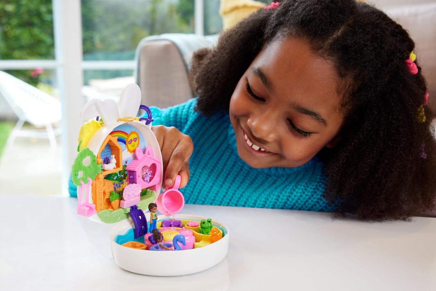 imagePolly Pocket Flower Garden Bunny Compact Playset with 2 Micro Dolls amp 12 Accessories Including 2 with Color ChangeBunny