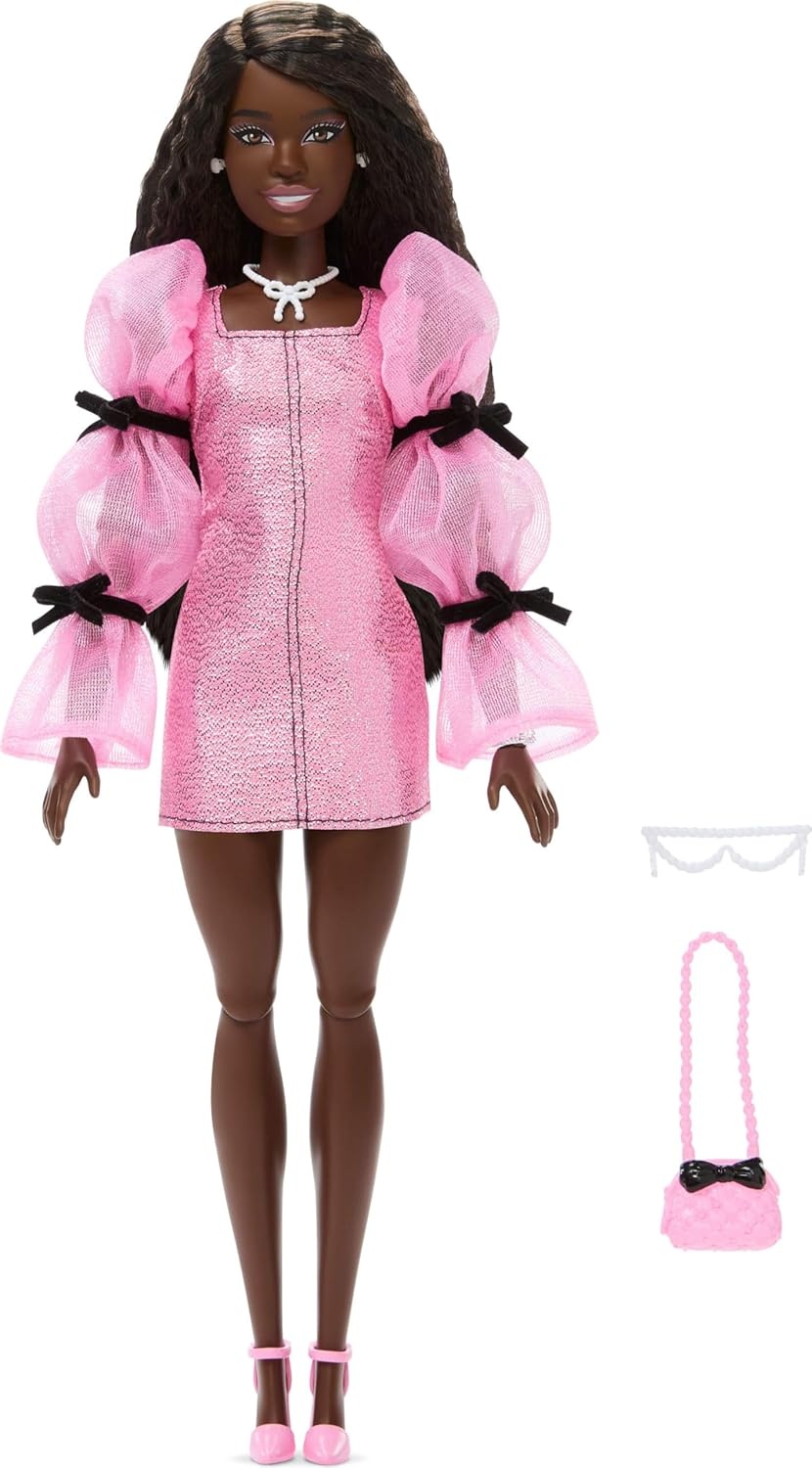 imageBarbie Deluxe Style Doll 14 in Metallic Pink Barbiecore Mini Dress with Long Puffed Sleeves and Black Bows Brown Hair Pearl Accessories PurseDress