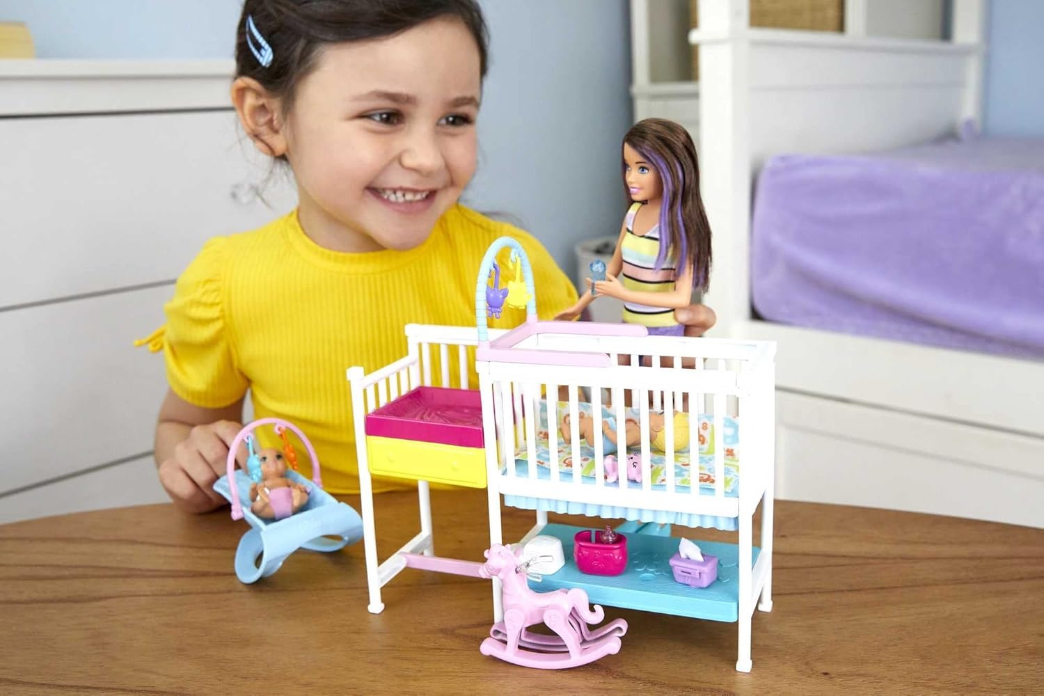 imageBarbie Skipper Babysitters Inc Bedtime Playset with Babysitting Skipper Doll Toddler Doll with GlowintheDark Pajamas Bed Sleeping Kitty Teddy Bear Blanket and Storybook for Kids 37 Years OldNursery Playset