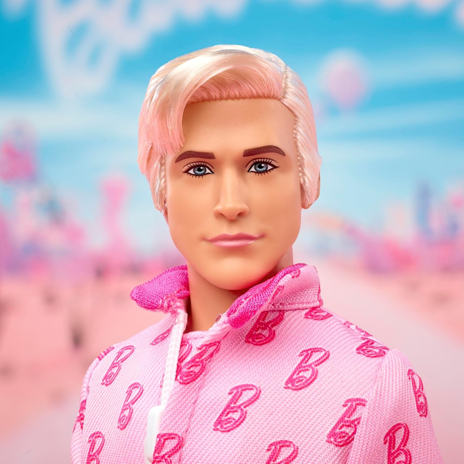 imageBarbie The Movie Ken Collectible Doll Ryan Gosling as Ken Wearing Pink Jumpsuit with B Detail with White Sneakers and Multicolor Roller Skates