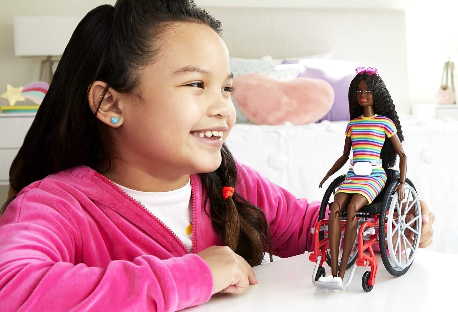 imageBarbie Fashionistas Doll 166 with Wheelchair amp Crimped Brunette Hair Wearing RainbowStriped Dress White Sneakers Sunglasses amp Fanny Pack Toy for Kids 3 to 8 Years Old
