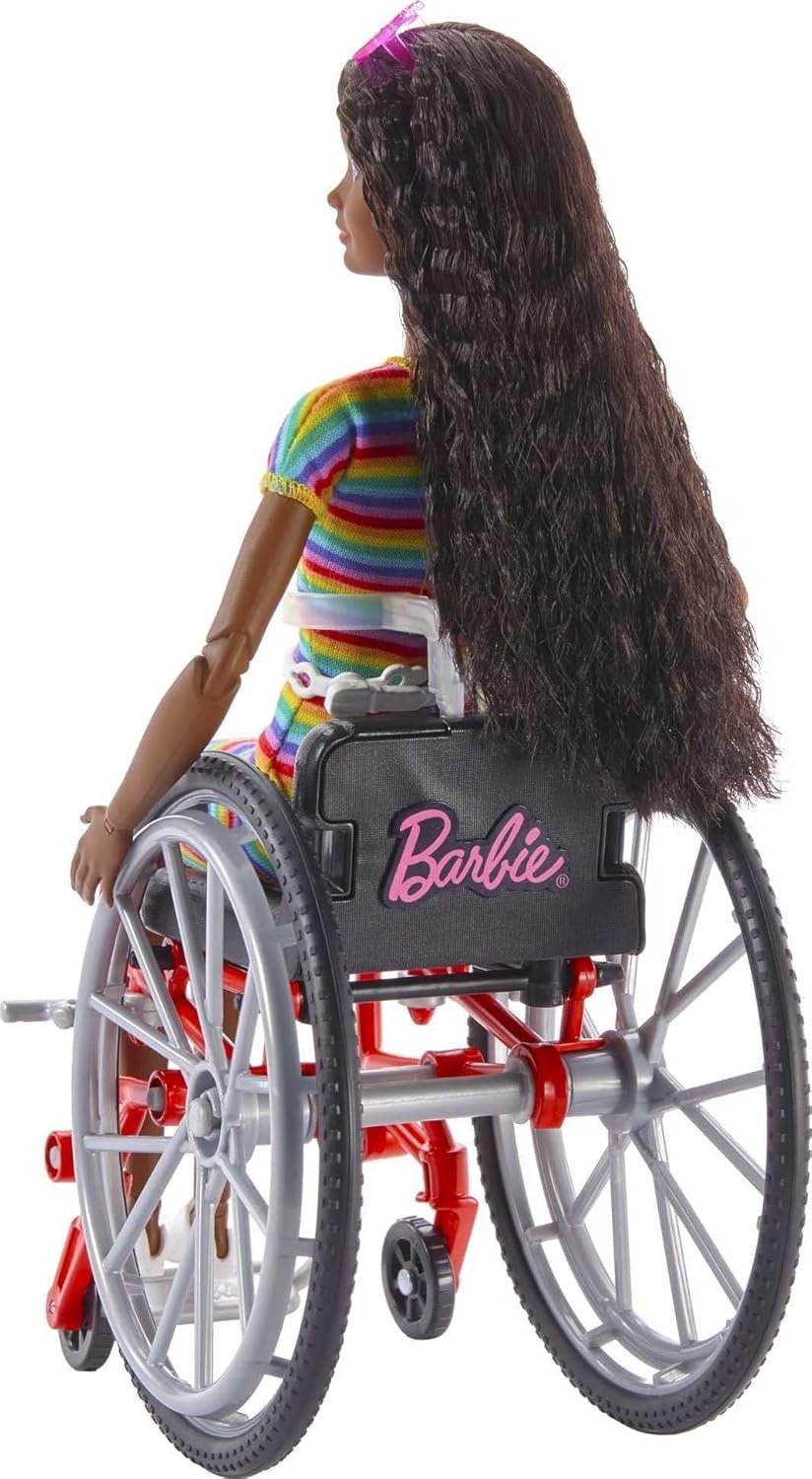 imageBarbie Fashionistas Doll 166 with Wheelchair amp Crimped Brunette Hair Wearing RainbowStriped Dress White Sneakers Sunglasses amp Fanny Pack Toy for Kids 3 to 8 Years Old
